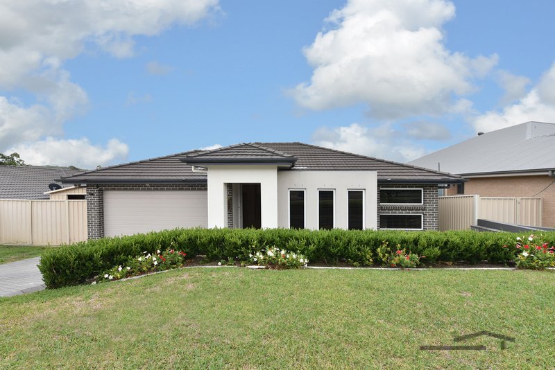 Photo - 10 Clarkstone Avenue, Cameron Park NSW 2285 - Image 1