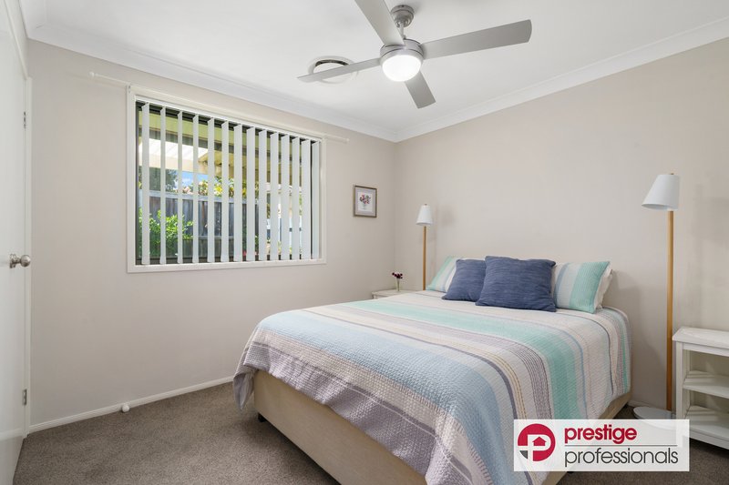 Photo - 12 Grenada Road, Glenfield NSW 2167 - Image 8