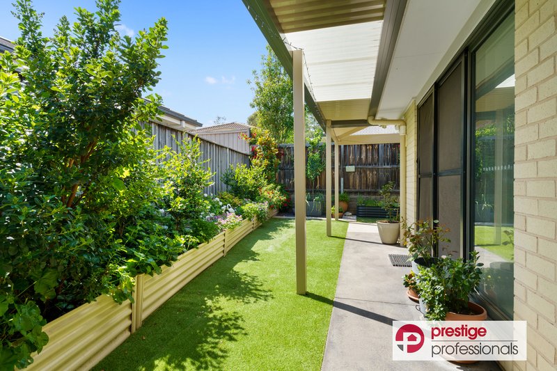 Photo - 12 Grenada Road, Glenfield NSW 2167 - Image 11