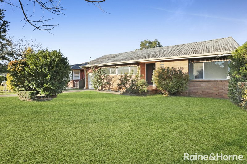 Photo - 12 Harvey Street, Macquarie Fields NSW 2564 - Image