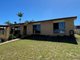 Photo - 12 Pleasant Avenue, Tannum Sands QLD 4680 - Image 1