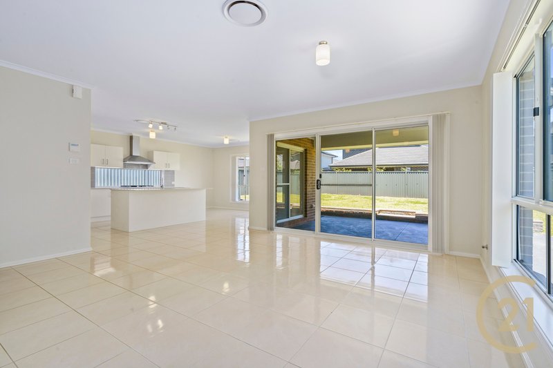 Photo - 12 Starfruit Street, Denham Court NSW 2565 - Image 2