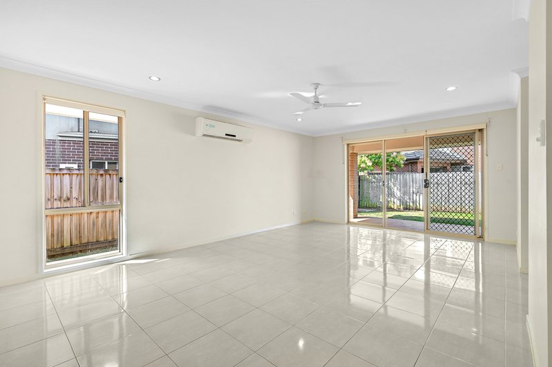 Photo - 12 Tall Trees Drive, Glenmore Park NSW 2745 - Image 3