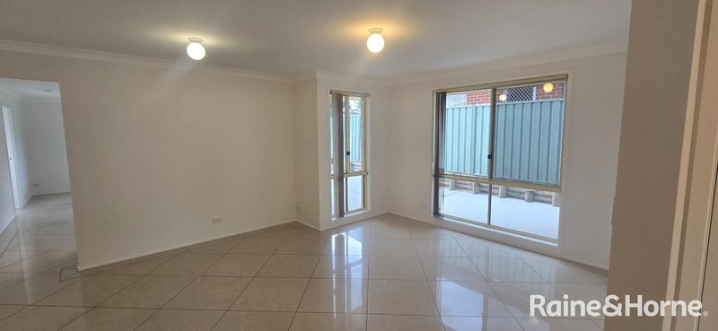 Photo - 13 Norman Dunlop Crescent, Minto NSW 2566 - Image 2