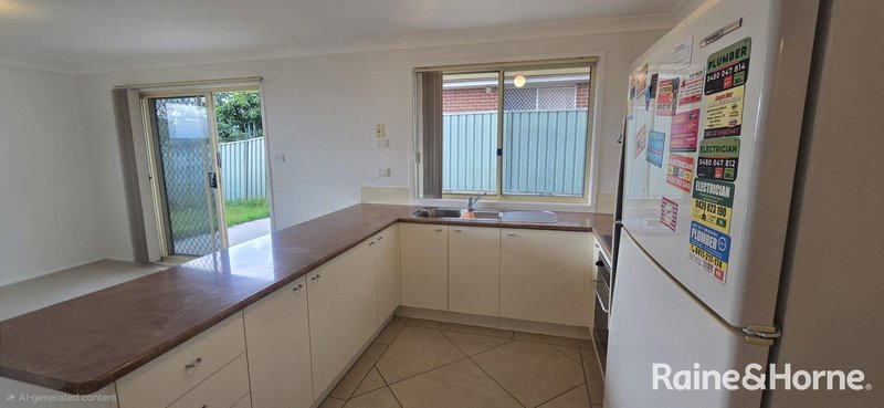 Photo - 13 Norman Dunlop Crescent, Minto NSW 2566 - Image 5