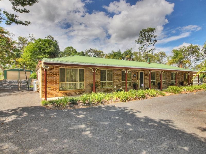 Photo - 143 Merluna Road, Park Ridge South QLD 4125 - Image 10