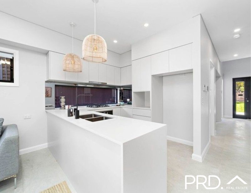 Photo - 15 Lehn Road, East Hills NSW 2213 - Image 1