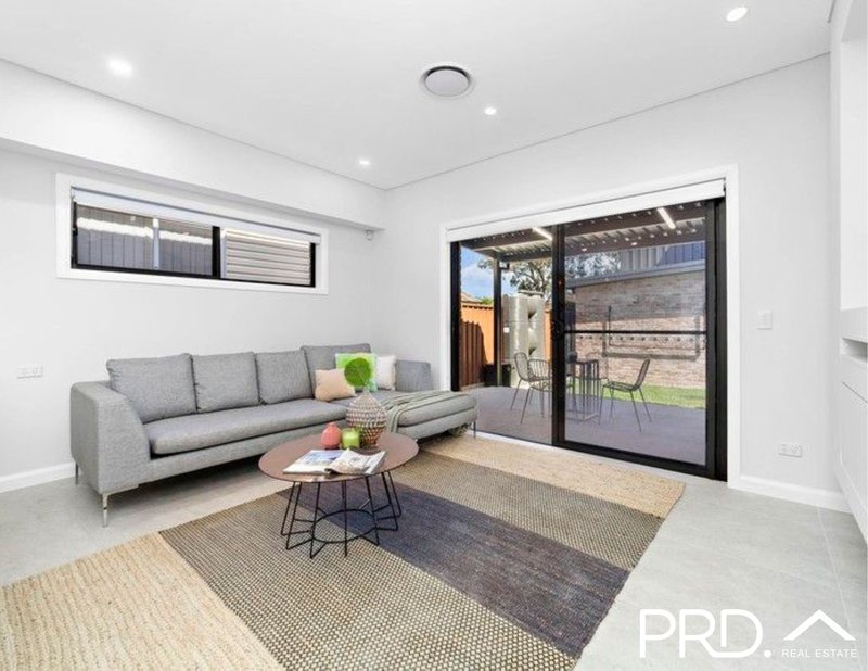 Photo - 15 Lehn Road, East Hills NSW 2213 - Image 2