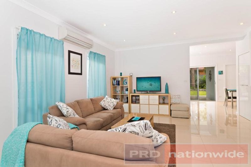 Photo - 15 Penrose Avenue, East Hills NSW 2213 - Image 2