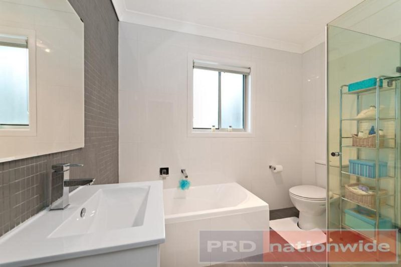 Photo - 15 Penrose Avenue, East Hills NSW 2213 - Image 6