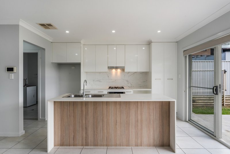 Photo - 16 Hebe Street, Glenfield NSW 2167 - Image 8