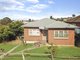 Photo - 18 Lake Heights Road, Lake Heights NSW 2502 - Image 2