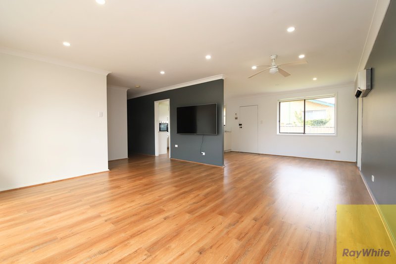 Photo - 19 Jacaranda Drive, Georges Hall NSW 2198 - Image 2