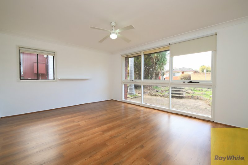 Photo - 19 Jacaranda Drive, Georges Hall NSW 2198 - Image 5