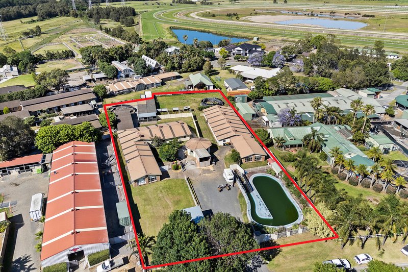 Photo - 1a Kingston Town Drive, Kembla Grange NSW 2526 - Image 2