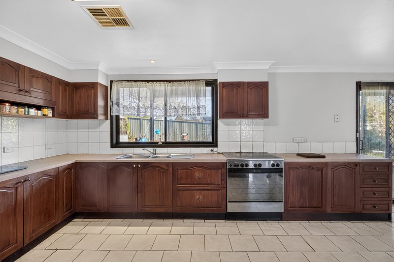 Photo - 2 Adrian Street, Macquarie Fields NSW 2564 - Image 2