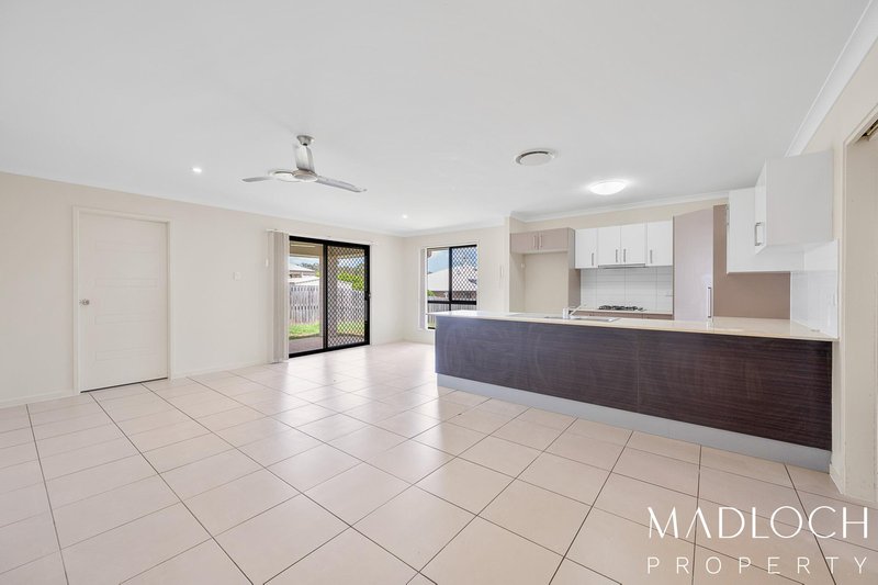 Photo - 2 Robinson Place, New Auckland QLD 4680 - Image 3