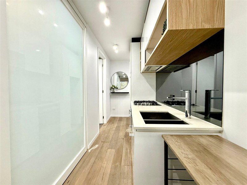 Photo - 203/315 La Trobe Street, Melbourne VIC 3000 - Image 1