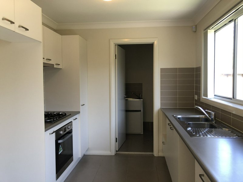 Photo - 21 Brothers Lane, Glenfield NSW 2167 - Image 2