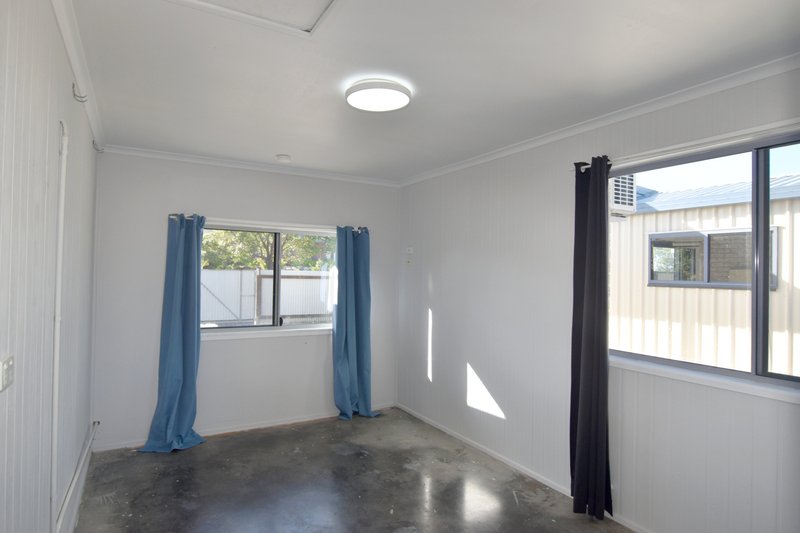 Photo - 21 Curtis Avenue, Boyne Island QLD 4680 - Image 15