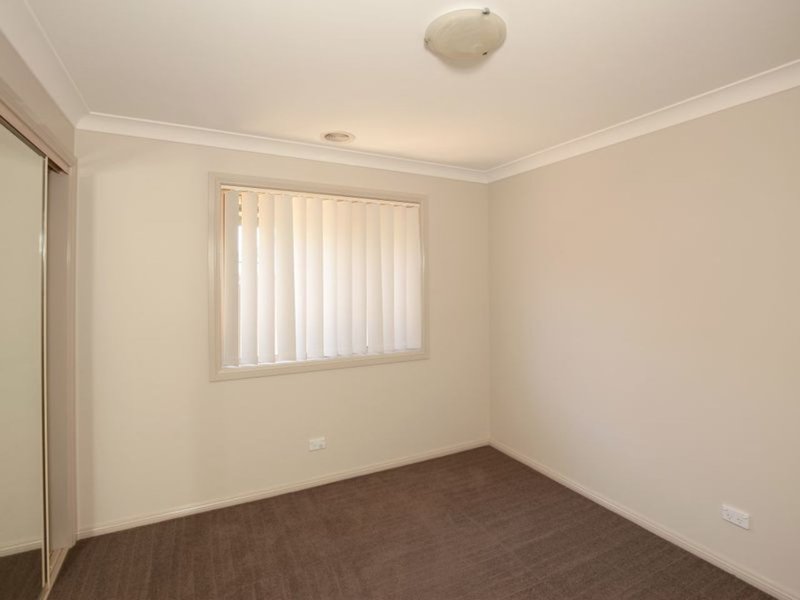 Photo - 21 Womboin Crescent, Glenfield Park NSW 2650 - Image 9