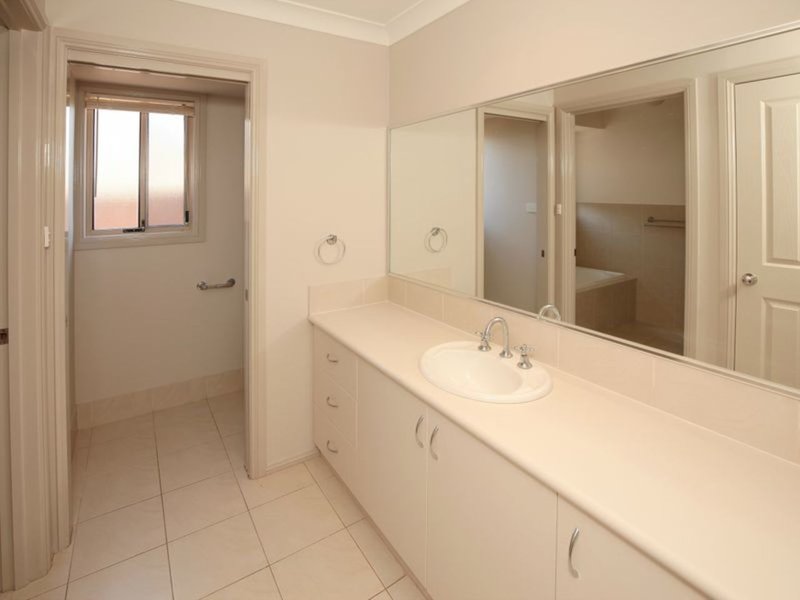 Photo - 21 Womboin Crescent, Glenfield Park NSW 2650 - Image 11