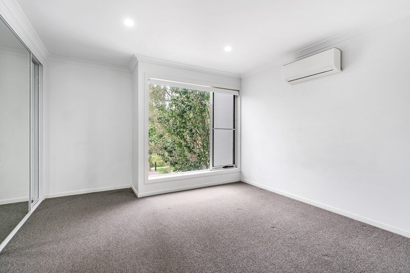 Photo - 217 Jamboree Avenue, Denham Court NSW 2565 - Image 6