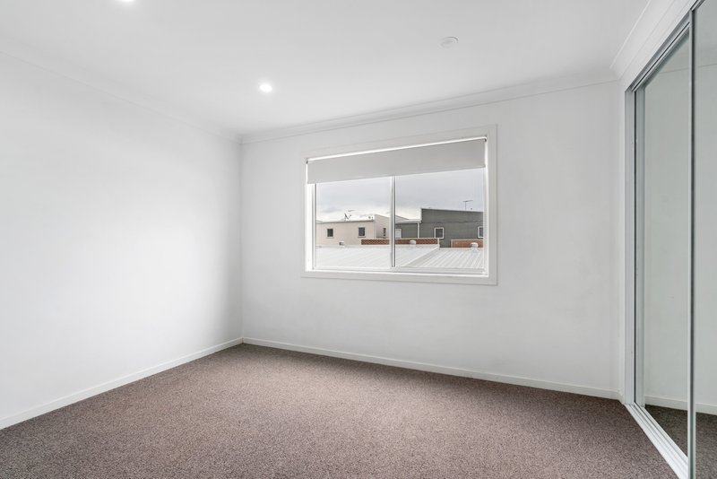 Photo - 217 Jamboree Avenue, Denham Court NSW 2565 - Image 7