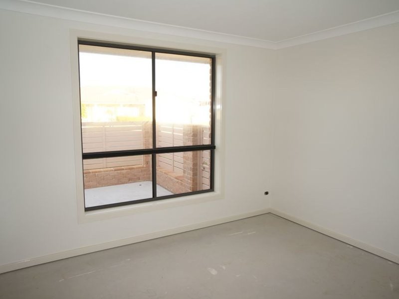 Photo - 2/2 Flagtail Avenue, Old Bar NSW 2430 - Image 6