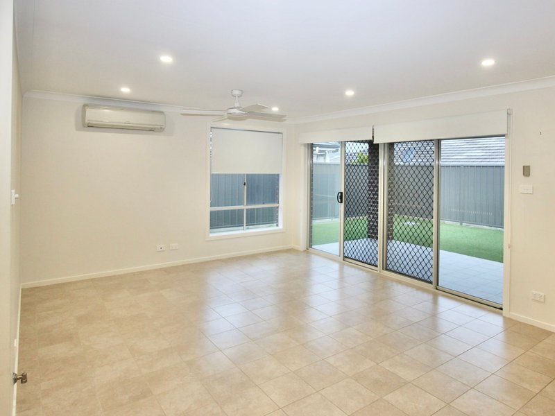 Photo - 22 Yarborough Road, Cameron Park NSW 2285 - Image 2
