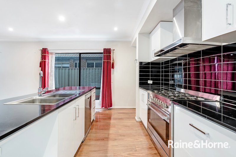 Photo - 256 Casey Fields Boulevard, Cranbourne East VIC 3977 - Image 3