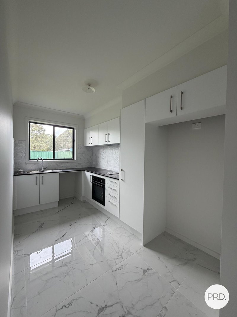 Photo - 25A Adrian Street, Macquarie Fields NSW 2564 - Image 1