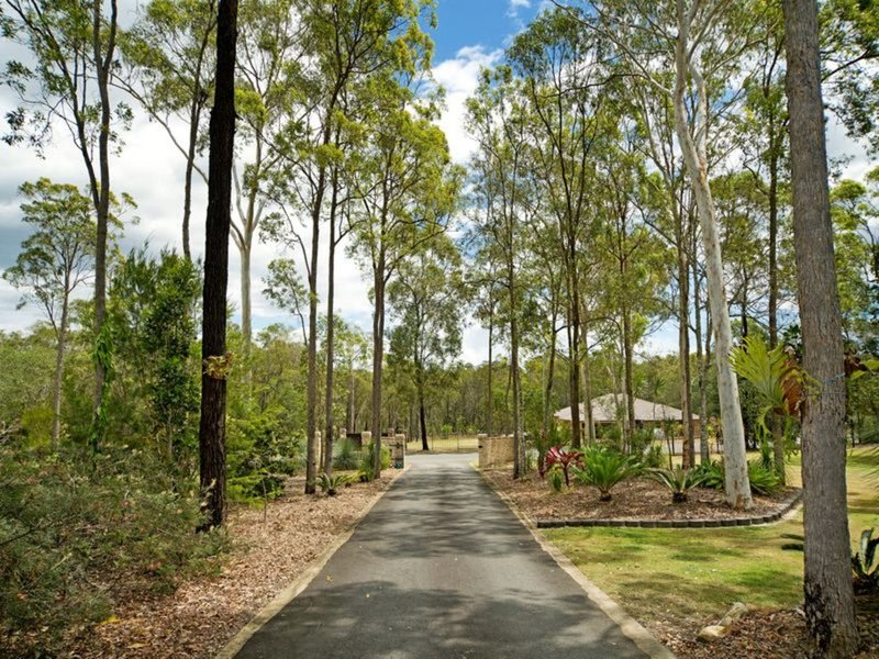 Photo - 27 Woodend Court, Park Ridge QLD 4125 - Image 22