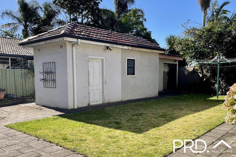 Photo - 2/711 Henry Lawson Drive, East Hills NSW 2213 - Image 1