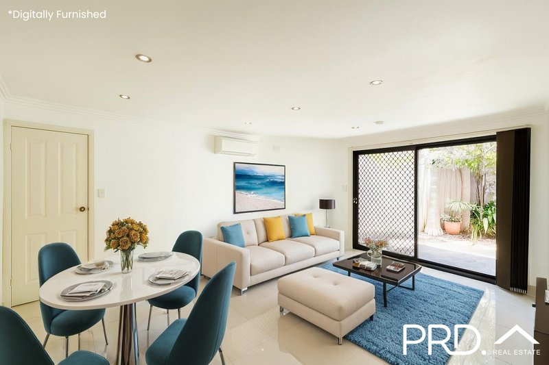 Photo - 2/711 Henry Lawson Drive, East Hills NSW 2213 - Image 2