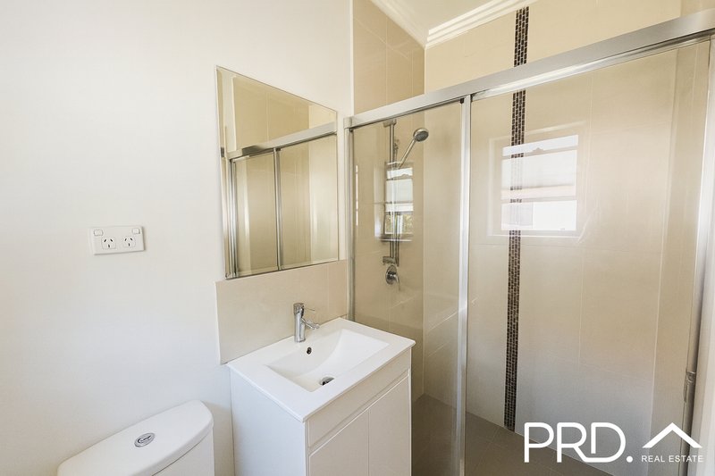 Photo - 2/711 Henry Lawson Drive, East Hills NSW 2213 - Image 5