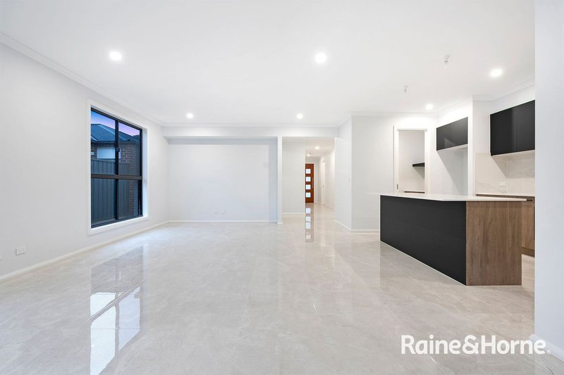 Photo - 28 Thulian Street, Clyde North VIC 3978 - Image 4