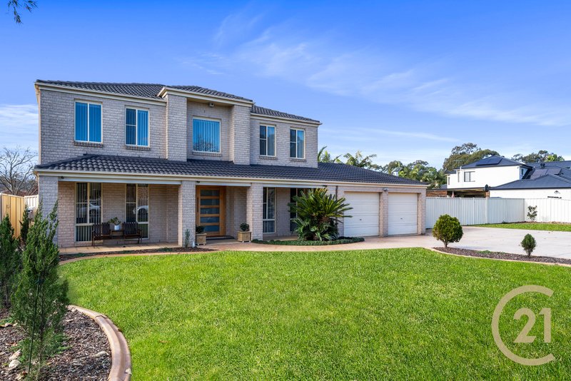 Photo - 28 Wattle Grove Drive, Wattle Grove NSW 2173 - Image 1