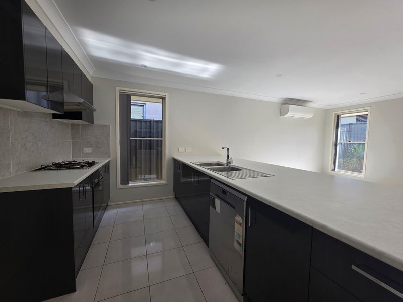 Photo - 29 Greenhood Crescent, Denham Court NSW 2565 - Image 2