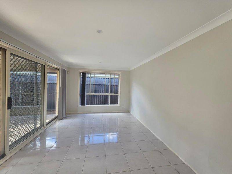 Photo - 29 Greenhood Crescent, Denham Court NSW 2565 - Image 4