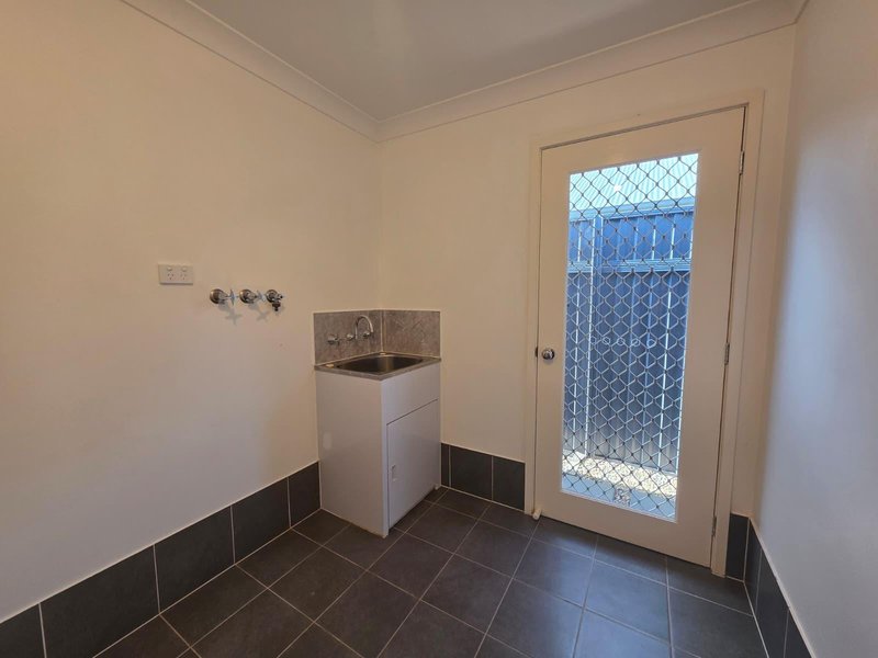 Photo - 29 Greenhood Crescent, Denham Court NSW 2565 - Image 9