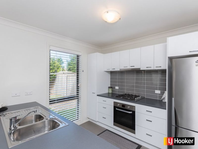 Photo - 29A Northampton Drive, Glenfield NSW 2167 - Image 4