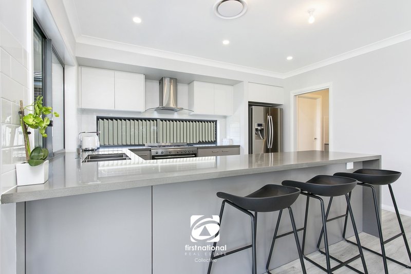 Photo - 3 Cryptandra Street, Denham Court NSW 2565 - Image 5