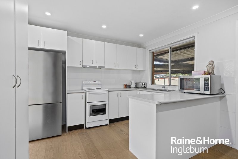 Photo - 3 Geranium Avenue, Macquarie Fields NSW 2564 - Image 5