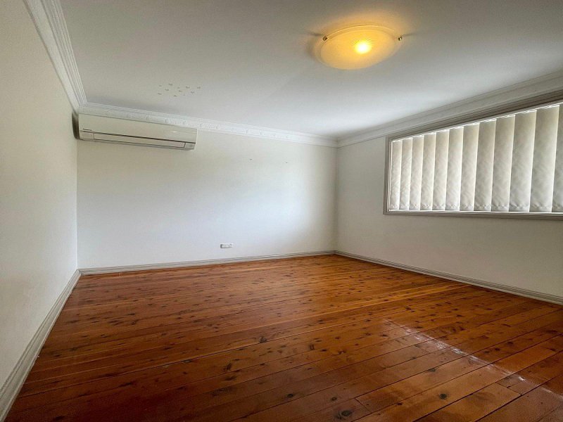 Photo - 3 Mimosa Road, Bossley Park NSW 2176 - Image 8