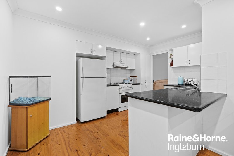 Photo - 33 & 33A Trobriand Crescent, Glenfield NSW 2167 - Image 8