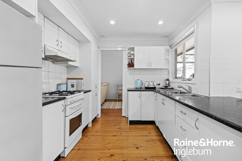 Photo - 33 & 33A Trobriand Crescent, Glenfield NSW 2167 - Image 9