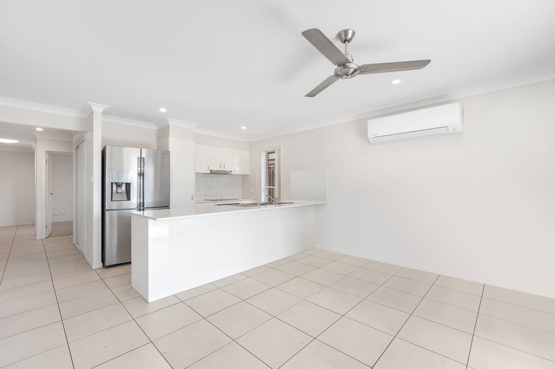 Photo - 34 Wicker Road, Park Ridge QLD 4125 - Image 4