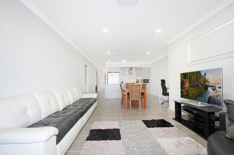 Photo - 38 Wildflower Crescent, Calderwood NSW 2527 - Image 5