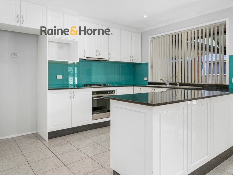 Photo - 4 Port Macquarie Avenue, Hoxton Park NSW 2171 - Image 3
